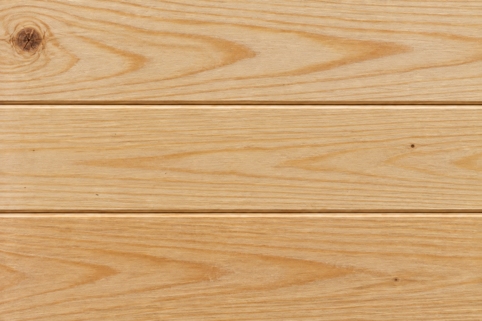 Illustration of three installed pine V-groove tongue-and-groove boards